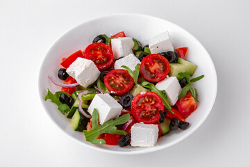 Greek salad top. Dishes for delivery, online store. Isolated on a white background.