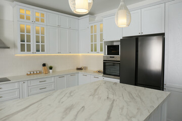 Beautiful kitchen interior with new stylish furniture