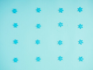 Blue christmas background with snowflakes.
