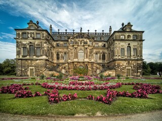 Fototapeta na wymiar Castle located in the grossen garten - Dresden (Germany) with its colorful flower garden.