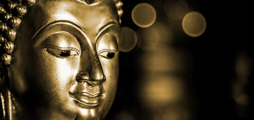 Selective focus  close-up shots of of the Buddha images with soft light and layout design for a...