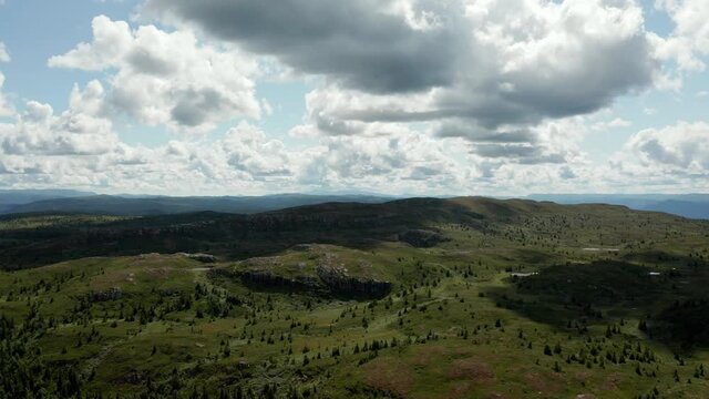 Arial shot with a drone from the mountains and forest in Norway, shot at the Vassfaret in Hallingdal.  The lake is very good fishing water with large trout. 