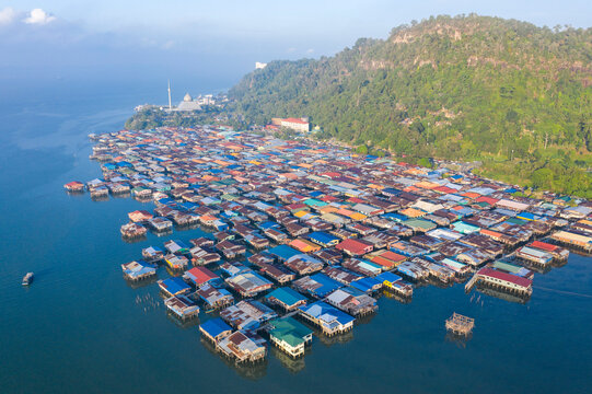 An aerial view of local water village houses at Kg. Sim Sim water village Sandakan City, Sabah, Malaysia. Sandakan once known as Little Hong Kong of Borneo.