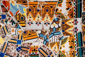 Close-up Mosaic Antonio Gaudi in the Park Guell, Barcelona