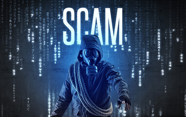 Fototapeta na wymiar Faceless hacker with SCAM inscription, hacking concept