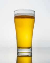 A glass of beer isolated on white background