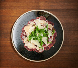 Meat carpaccio with cheese