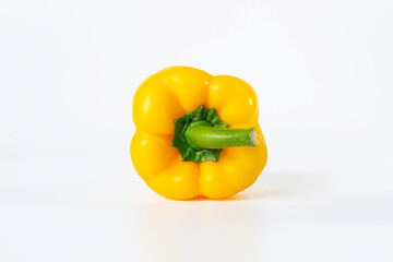 A yellow bell pepper isolated on white background