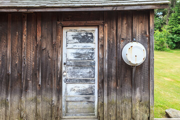 Basin and Weathered Door
