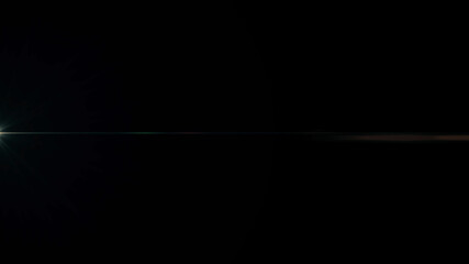 Anamorphic lens flare from a photo camera lens. Anamorphic background.