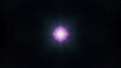 Beautiful lens flare with rays on a black background.