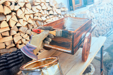 Varnish paint on a vintage object. Hobby of repairing wooden objects