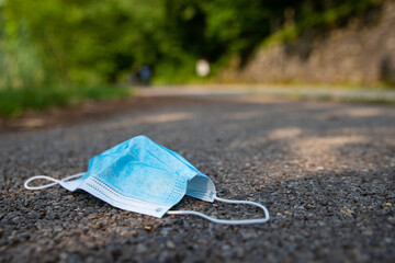 surgical mask thrown on the street