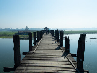 U-Bein bridge, the longest teakwood bridge in the world, crossing Taungthaman Lake near Amarapura in Myanmar.