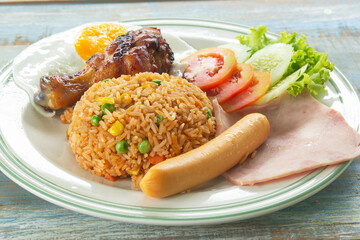 Fried rice Thai Style Served Grilled Chicken, Saucesage ,Ham and Fried Egg