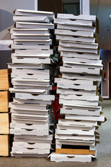 Tower of empty pizza boxes after a Corporate Function