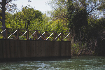 wooden bridge over river at the forest