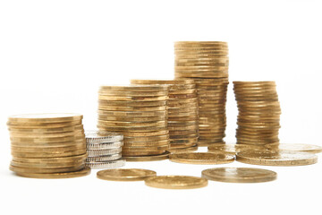 Stacks of coins on a white background.