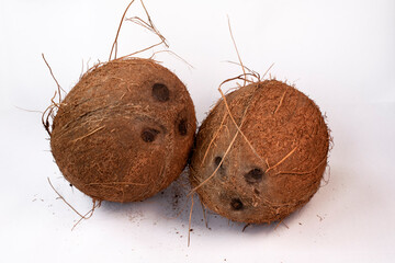 Whole coconuts isolated on white