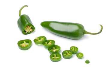 Fresh green jalapeno peppers and slices - obrazy, fototapety, plakaty
