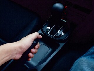 hand with remote control