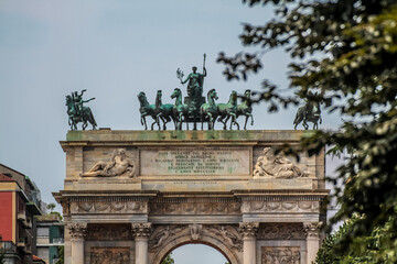 Fototapeta na wymiar Arch of Triumph (Arco della Pace) at Park Sempione in Milan