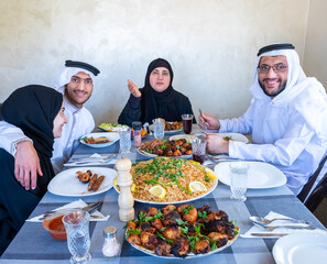 Happy arabic muslim family enjoying the food togther in ramadan