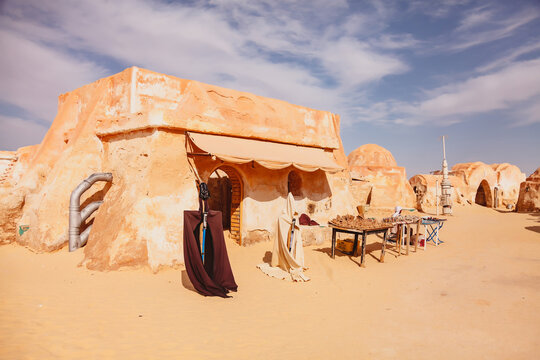 Star Wars decoration in Sahara desert. Appearance of original set was used in film. Ong Jewel Star Wars Location in Tunisia. Buildings in Ong Jemel, Tunisia. Place near lake