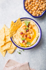 Directly above shot of Hummus or humus In bowl on table. Vegan plant based food