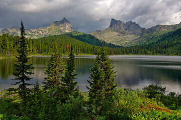 Naklejka na ściany i meble Russia. Krasnoyarsk region, East Sayan mountains. Lake Svetloye in the natural mountain Park Ergaki (translated from the Turkic 