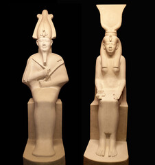 Figures of Egyptian gods Osiris and Isis on black backgroung. Osiris is lord of the death and resurrection. Isis was a major goddess in ancient Egyptian religion, the sister and wife of Osiris.