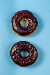 Two Donuts on blue background