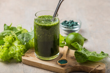 Green smoothie with spirulina. Young barley and chlorella spirulina. Detox superfood.