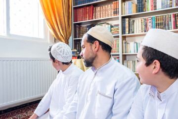 Fototapeta na wymiar Muslim family leaning left and right to finish praying