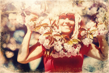 beautiful shamanic woman with headband in the nature. Old photo effect.