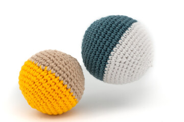 a couple of knitted balls