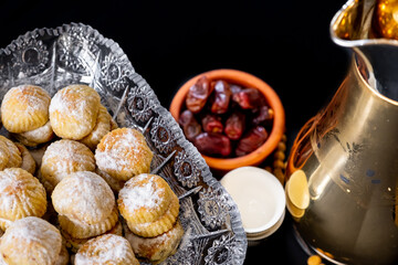 Eid sweets with coffee and date