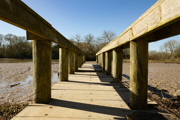 wooden bridge over the river
