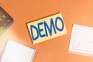 Word writing text Demo. Business photo showcasing exemplification display expression show visual communication reflection Cardboard paperboard notebook office study supplies chart reminder paper