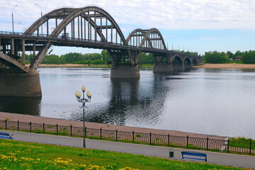 Bridge across Volga river from Volzhskaya embankment. Rybinsk, Yaroslavl Oblast, Russia.