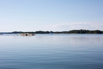 Calm water on the sea in Nordic landscape