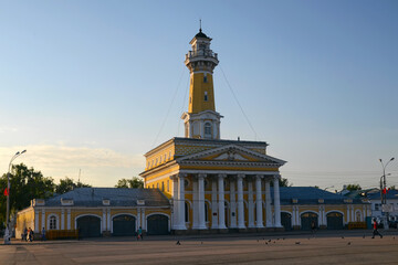 Fototapeta na wymiar Fire tower (19th century) on the Central square is the symbol of the town. Kostroma town, Kostroma Oblast, Russia.
