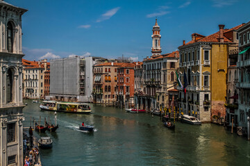 Amazing view on the beautiful Venice, Italy. Many gondolas sailing down one of the canals.