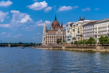 A view of the east bank of the River Danube in Budapest from a boat on the river during summertime