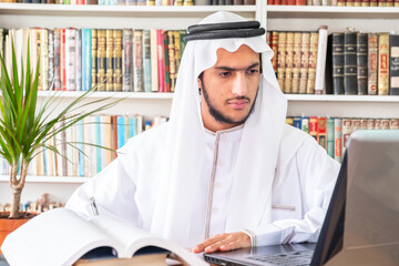 Arabic muslim student studying online