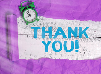 Writing note showing Thank You. Business concept for polite expression to acknowledge a gift,...