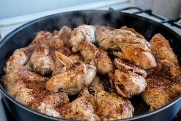 Tray filled with chicken to go to oven