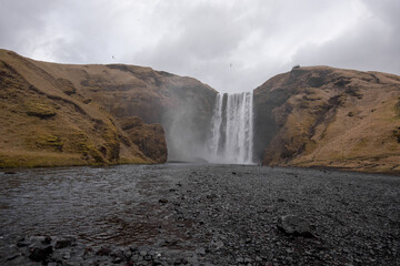 Skogarfoss waterfall in Iceland on an overcast day
