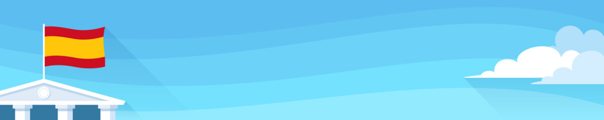 Banner with spain flag on roof of administrative or government or consulate building