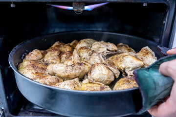 Tray filled with chicken to go to oven